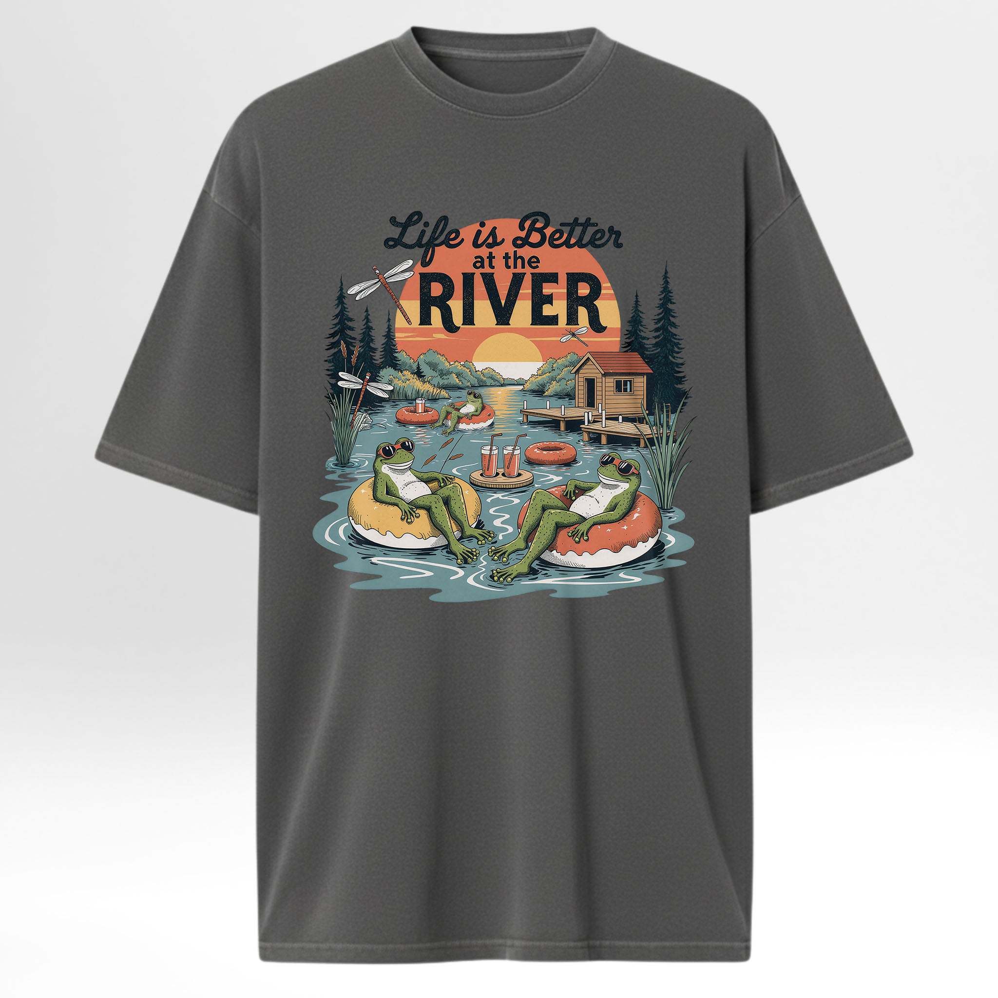 Gray t-shirt with 'Life is Better at the River' graphic design featuring frogs, a cabin, and nature elements.