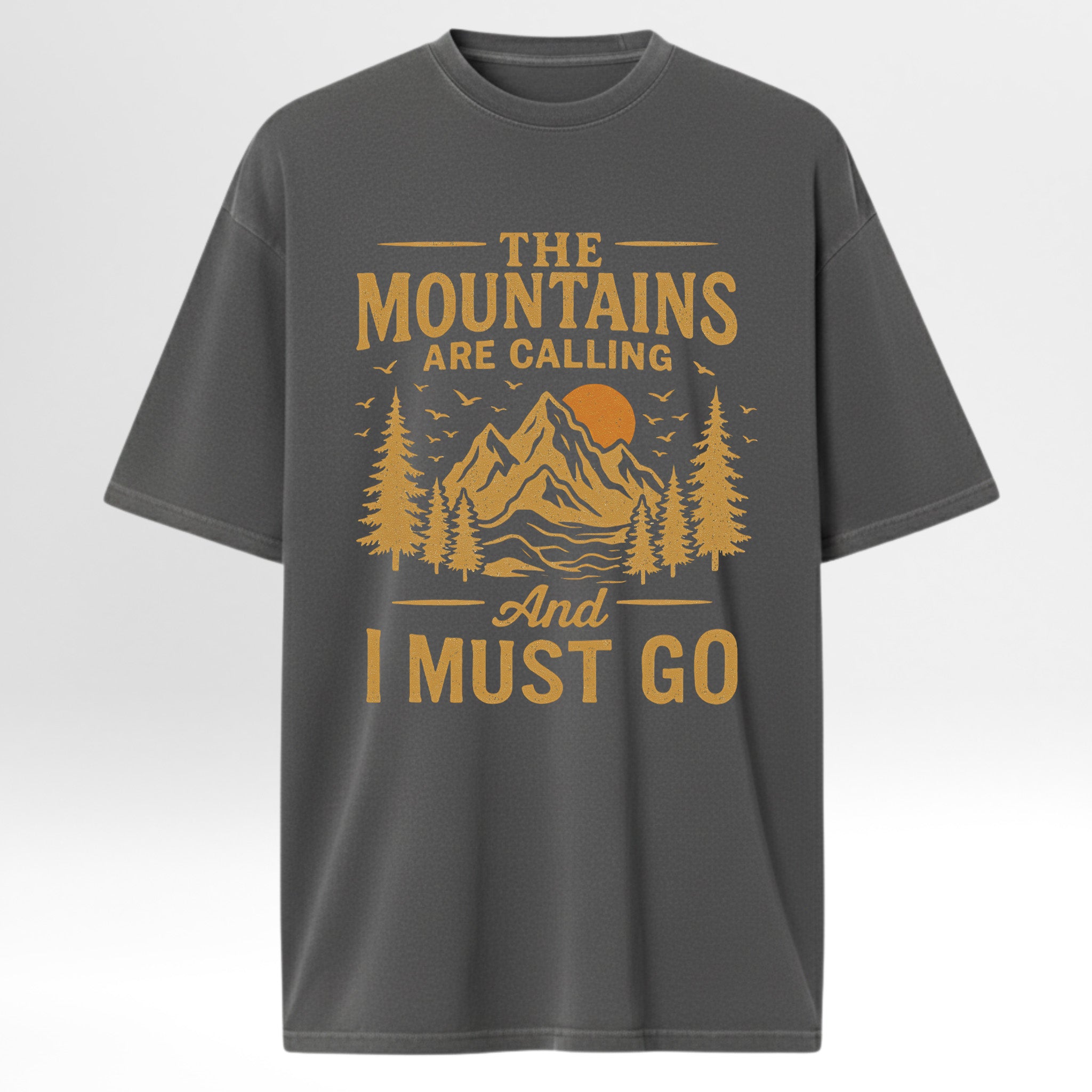 Gray t-shirt with yellow graphic and text 'The Mountains Are Calling And I Must Go' 