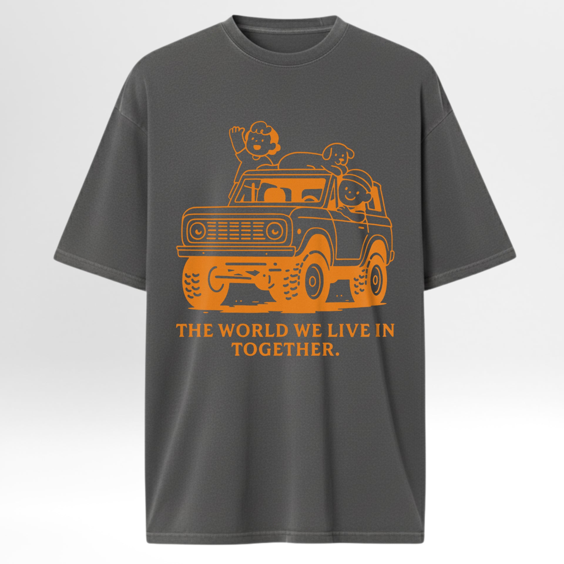 Gray trail graphic t-shirt with orange graphic and text 'The World We Live In Together' on a white background