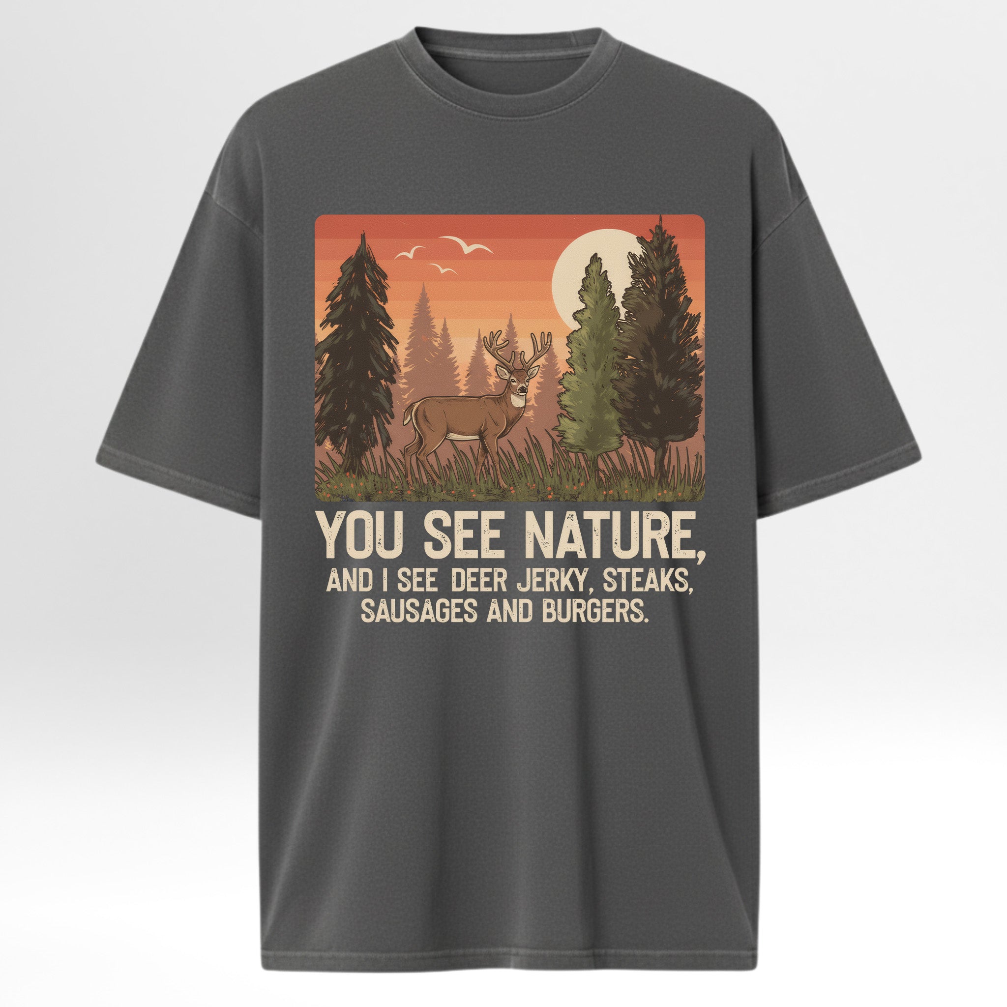 Gray t-shirt with a graphic of a deer in a forest and humorous text 'You See Nature And I See A Deer Jerky Steaks Sausages And Burgers'