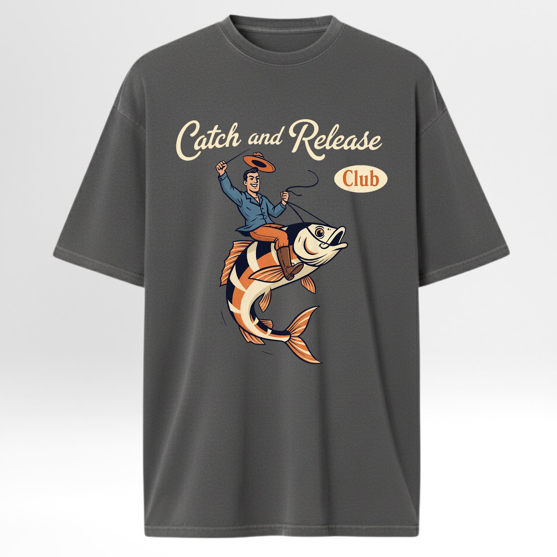 Gray fishing t-shirt with a graphic of a man on a fish and 'Catch and Release Club' text.