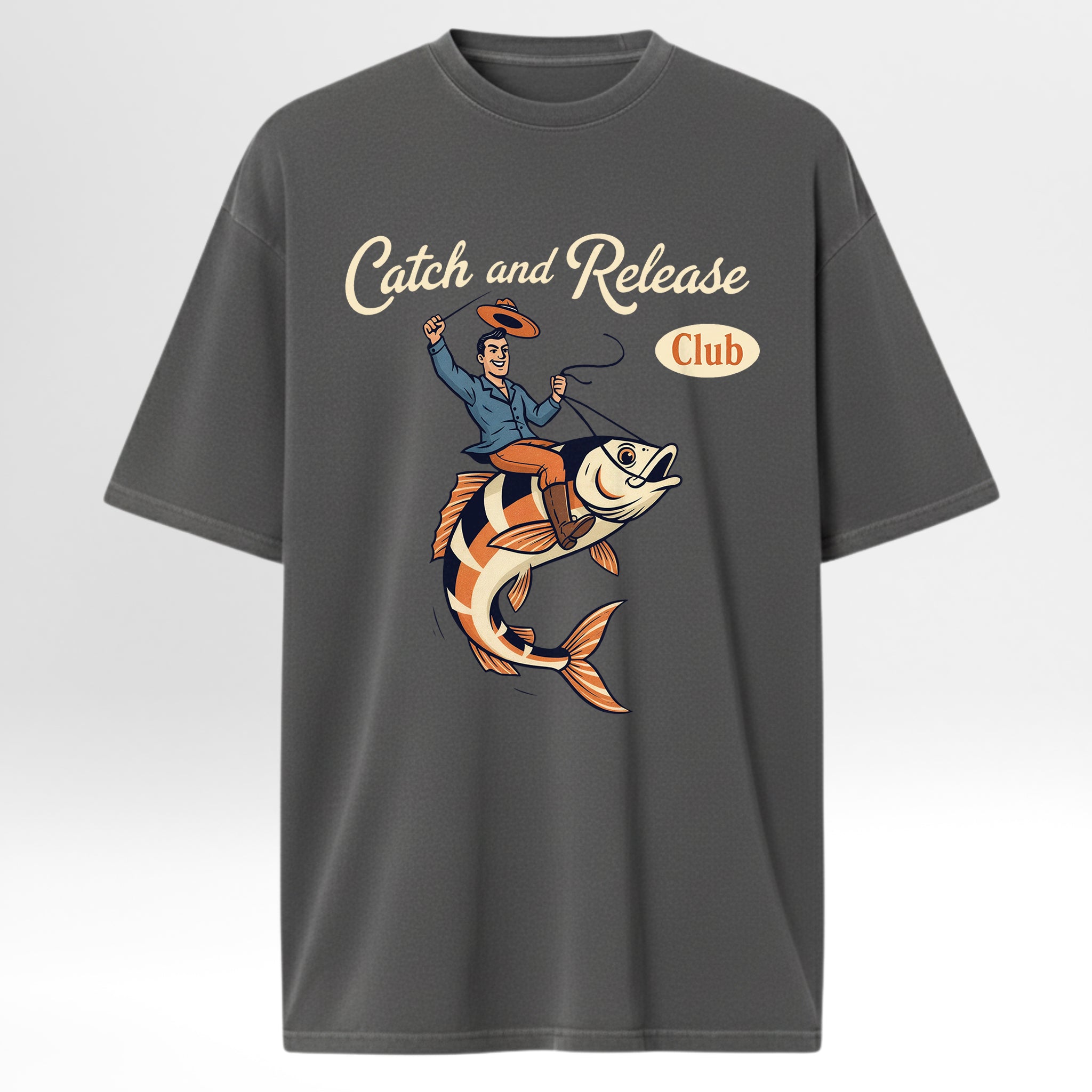 Gray fishing t-shirt with a graphic of a man on a fish and 'Catch and Release Club' text.