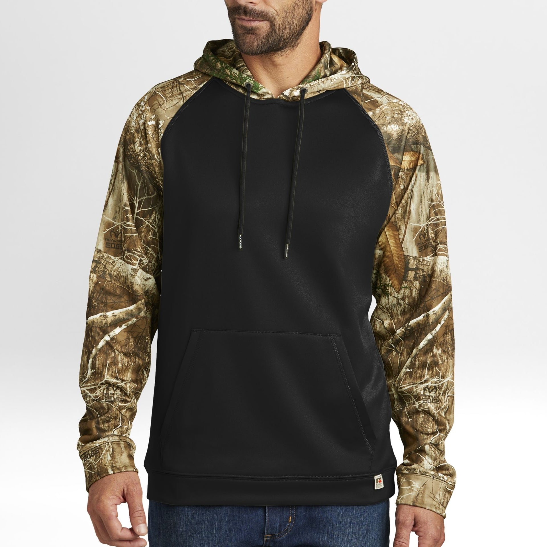 Black hoodie with Realtree Edge camouflage sleeves worn by a person on a white background
