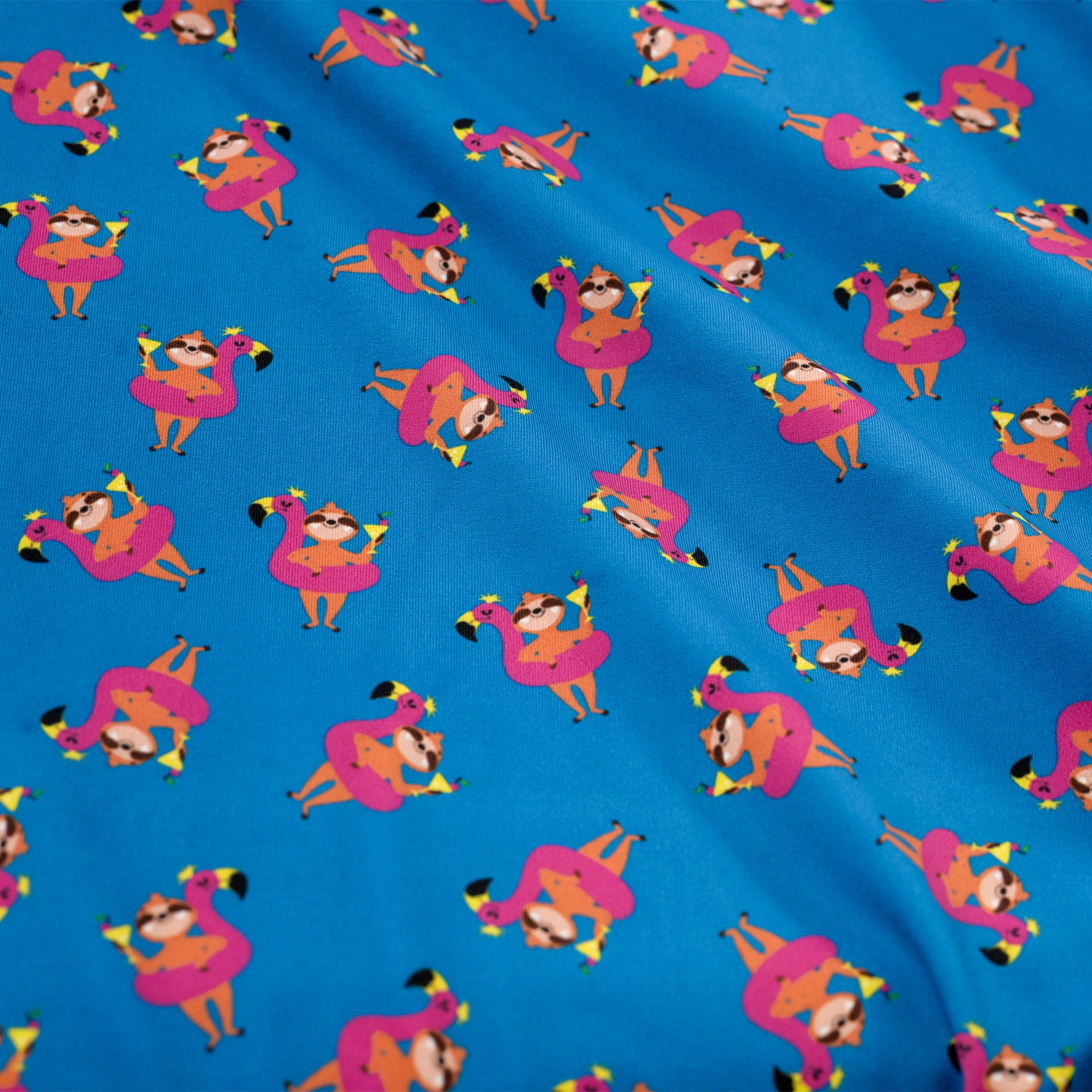 Pattern of sloth on pink flamingo float on a blue background