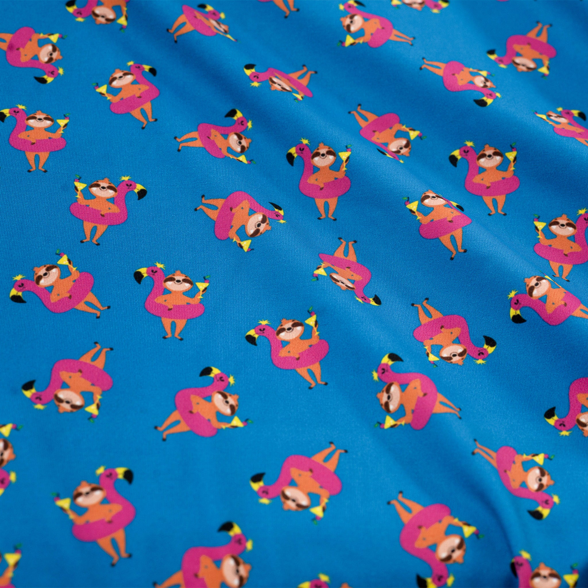 Pattern of sloth on pink flamingo float on a blue background