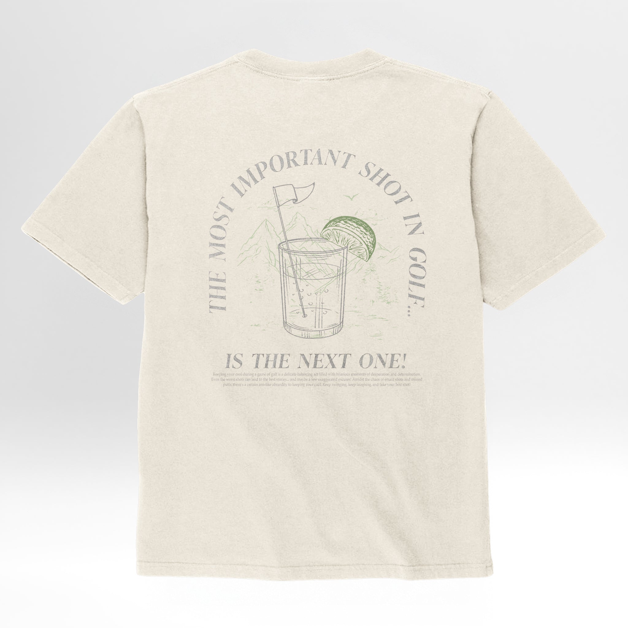 Beige t-shirt with graphic design and text 'The Most Important Shot In Golf Is The Next One'.