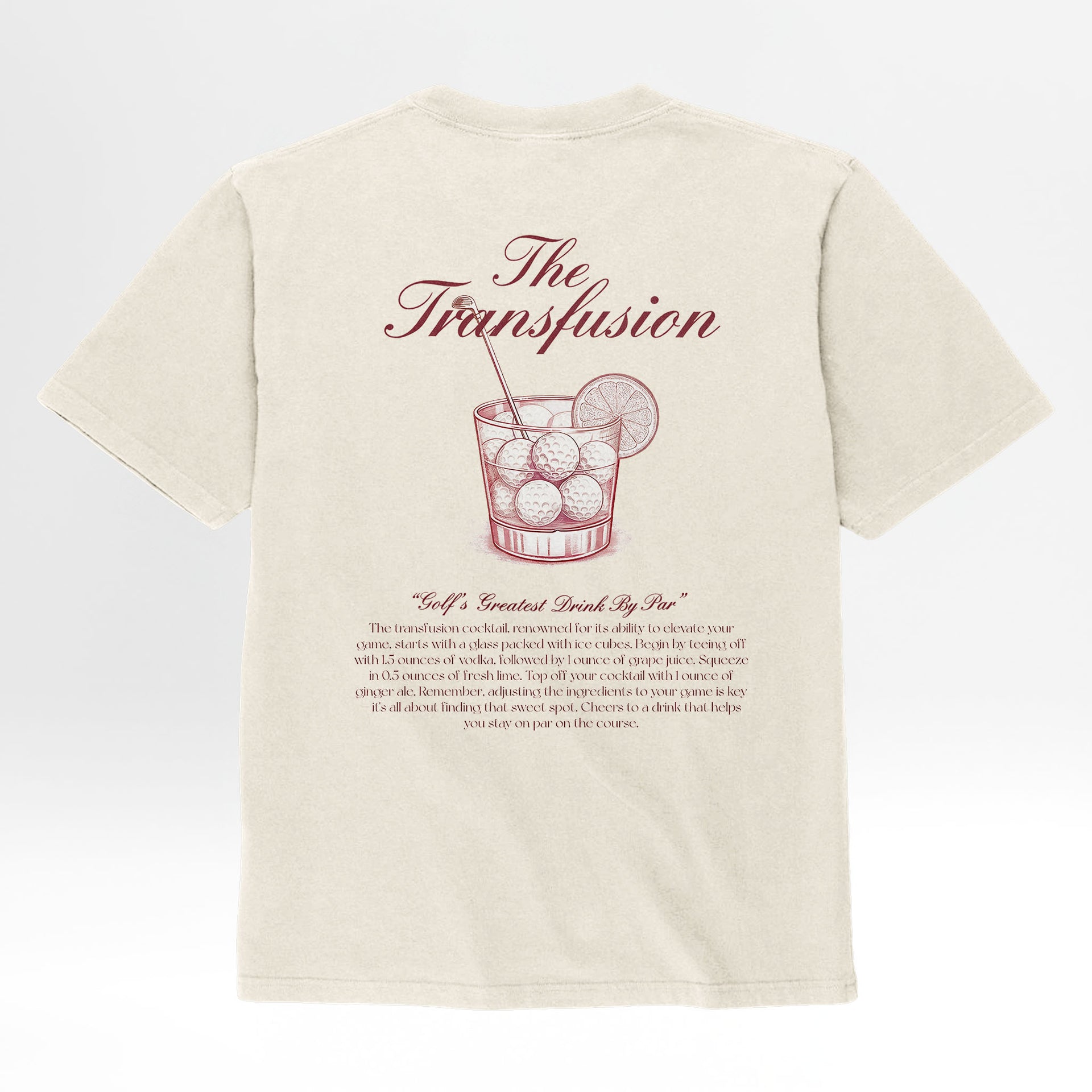 Beige t-shirt with cocktail graphic and red text 'The Transfusion Golf's Greatest Drink By Par'.