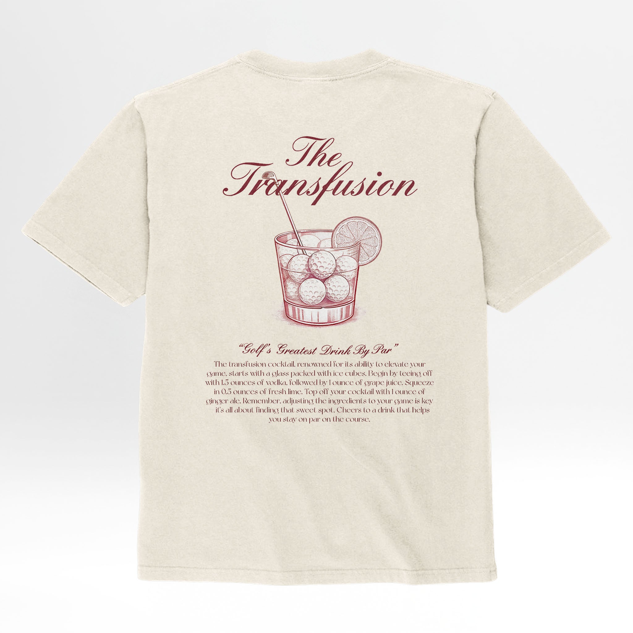 Beige t-shirt with cocktail graphic and red text 'The Transfusion Golf's Greatest Drink By Par'.