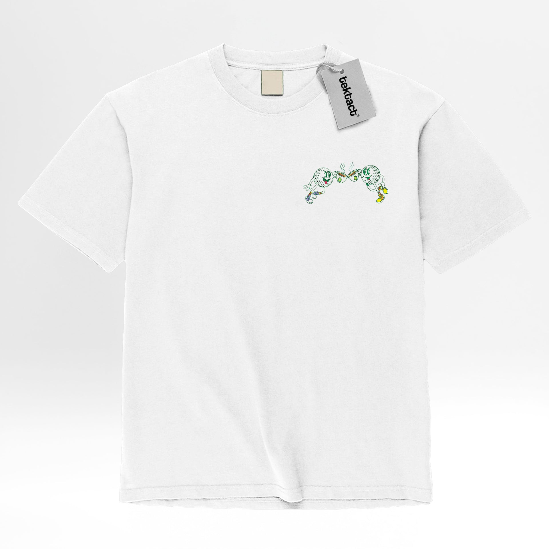 White t-shirt with green graphic design featuring golf balls and text 'Let's Meet For Tee'