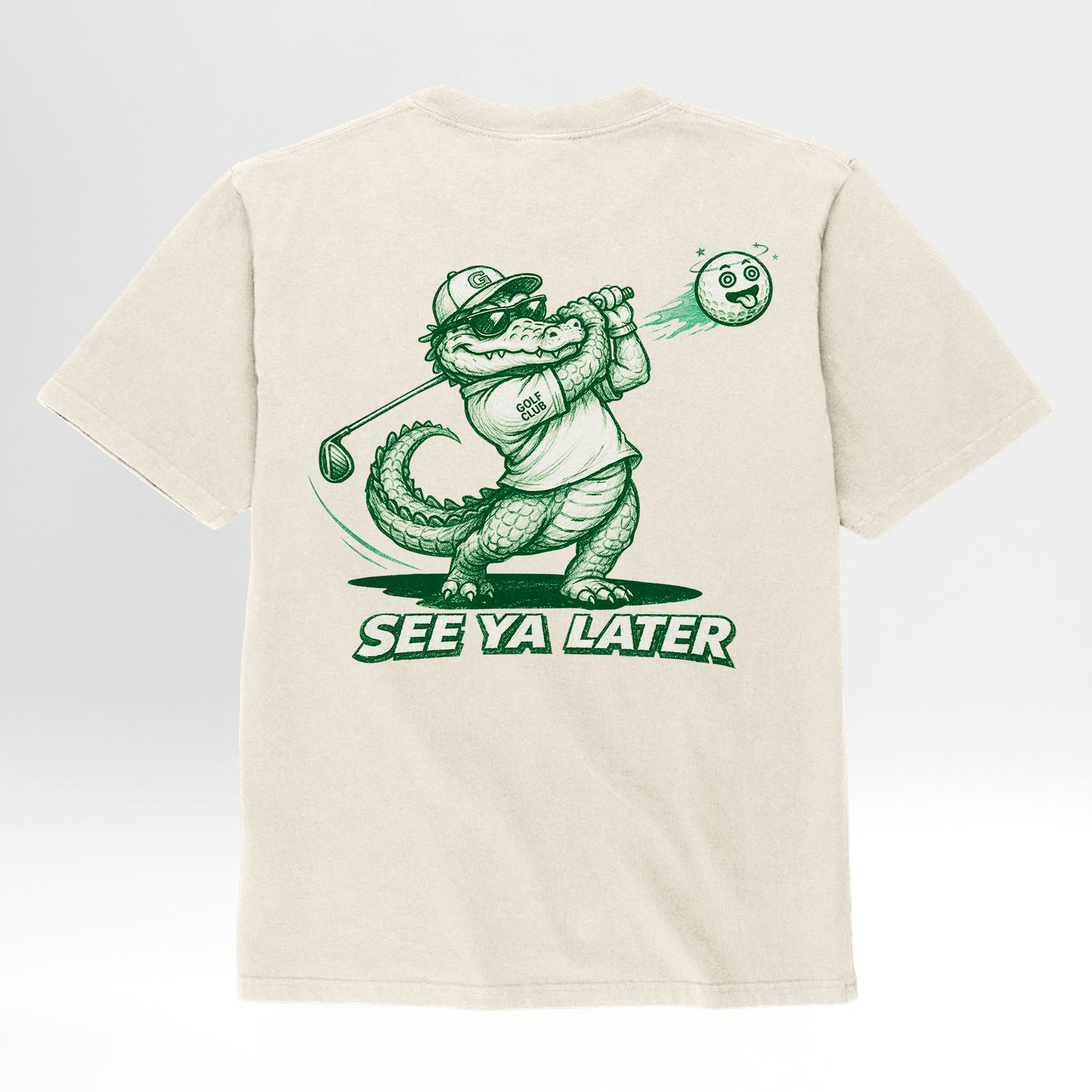 Ivory cream t-shirt with a graphic of a crocodile playing golf and 'See Ya Later' text on a white background